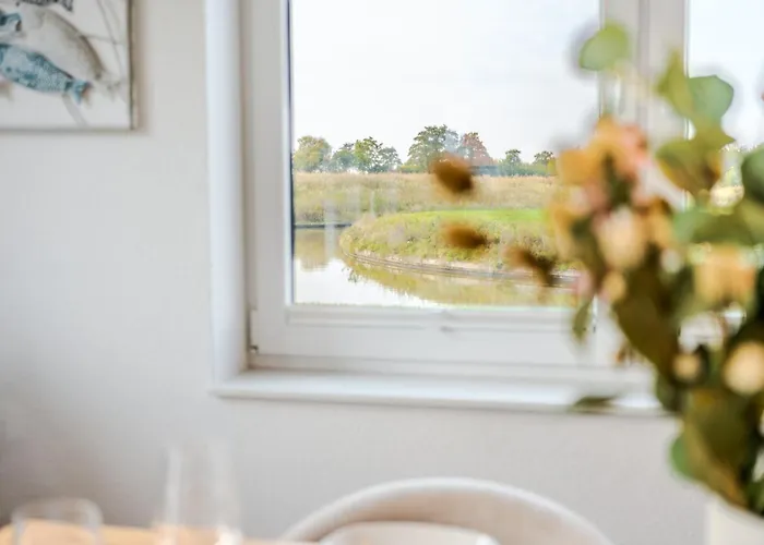 Dom wakacyjny Kuesten Haus Grachtenwinkel Direkte Wasserlage, 2 Terrassen, 106qm, Neubaugebiet